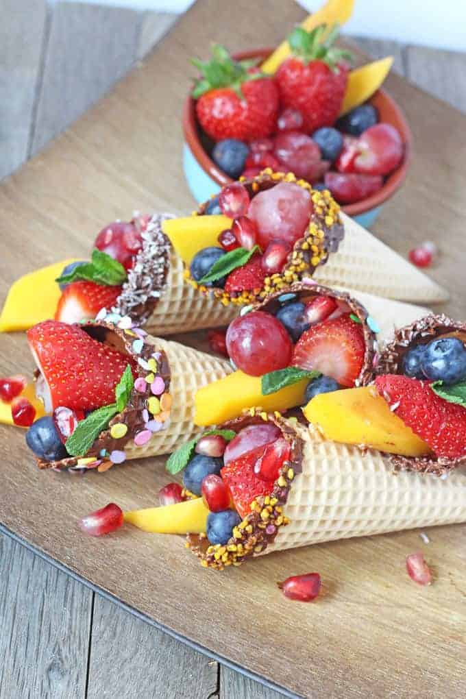 delicious & colorful chocolate dipped, fruit filled cone, this is one of the most delicious garden party ideas to try