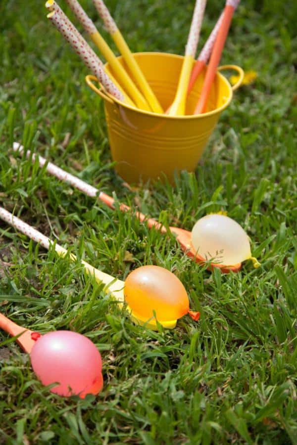 A fun waterballoon garden party games idea, one of the simplest garden party ideas