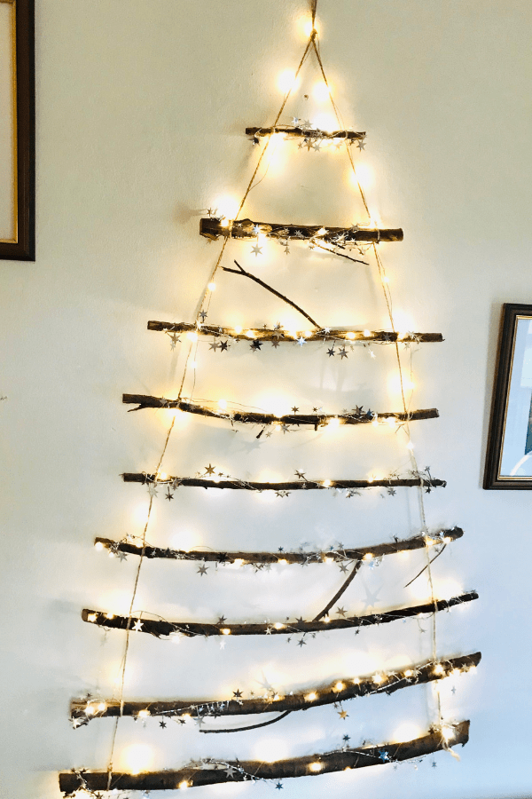 How To Make This DIY Stunning Twig Christmas Tree You Can Make In Less Than 30 Minutes | DIY Christmas Decorations | Rustic Christmas tree | DIY Christmas tree Via https://themummyfront.com #christmastreeideas #christmastree #diychristmascrafts #diychristmasdecorations