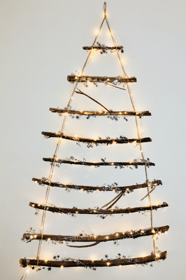 How To Make This DIY Stunning Twig Christmas Tree You Can Make In Less Than 30 Minutes | DIY Christmas Decorations | Rustic Christmas tree | DIY Christmas tree Via https://themummyfront.com #christmastreeideas #christmastree #diychristmascrafts #diychristmasdecorations