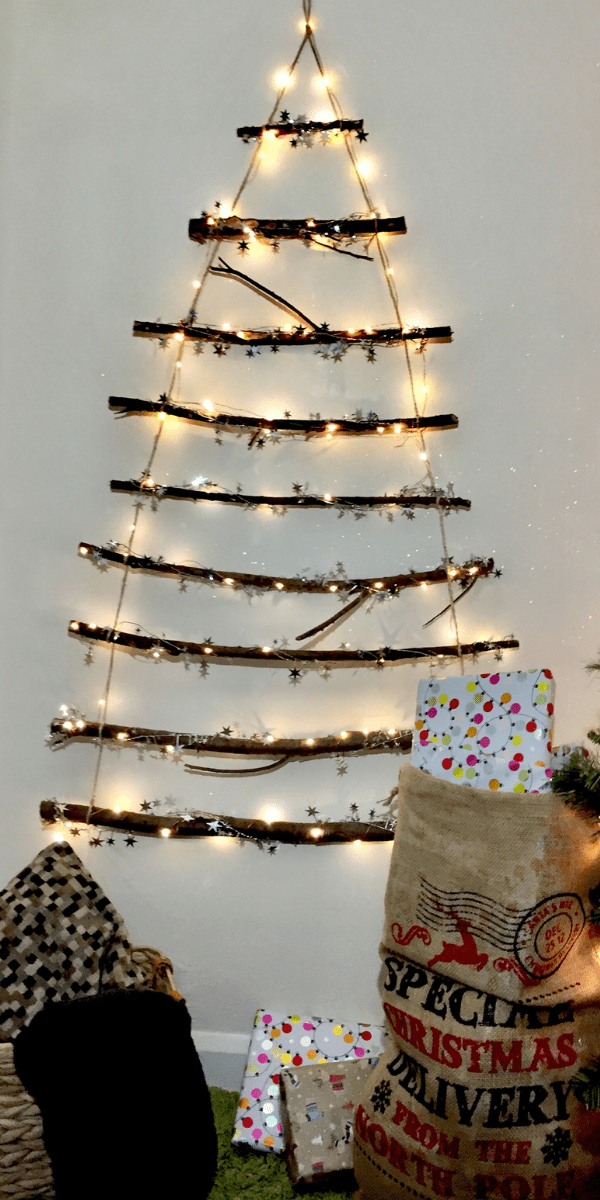 How To Make This DIY Stunning Twig Christmas Tree You Can Make In Less Than 30 Minutes | DIY Christmas Decorations | Rustic Christmas tree | DIY Christmas tree Via https://themummyfront.com #christmastreeideas #christmastree #diychristmascrafts #diychristmasdecorations