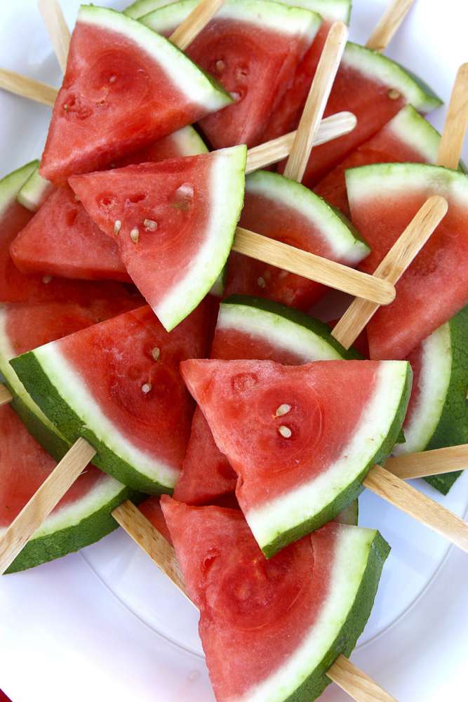 Watermelon on a stick is the perfect summer party dessert idea. These watermelons on sticks only take 5 minutes to prepare & everyone at your summer party will enjoy them!