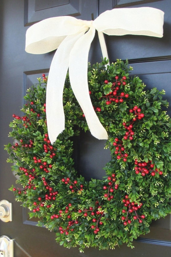 The stunning red and green touches on this wreath make it one of the best Christmas wreaths this year