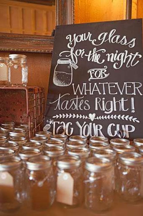 Mason jars used as cups at wedding