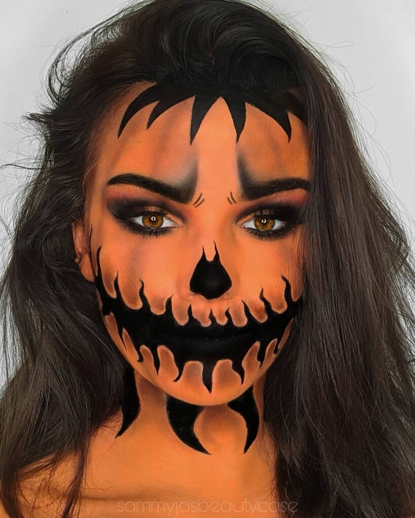 Spooky & Sizzling: 17 Pumpkin Face Paint Ideas For Women - The Mummy Front