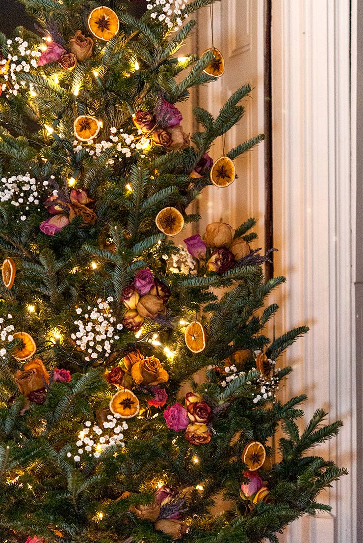 Christmas tree with dried orange slices, babies breath and dried flower ornaments