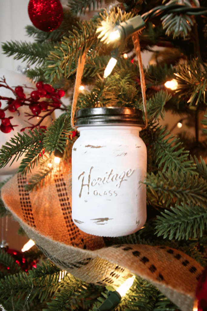 Miniature painted mason jar hanging on a Christmas tree