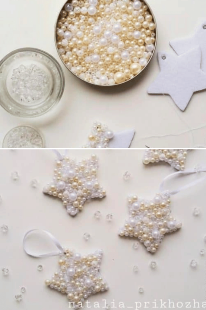 Little white felt stars with gold and pearl bead decorations