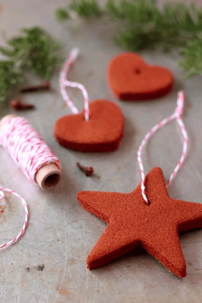 Star and heart shape decorations made with cinnamon