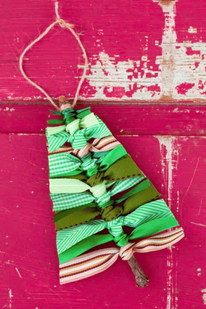 Christmas tree decoration made with ribbons and twigs