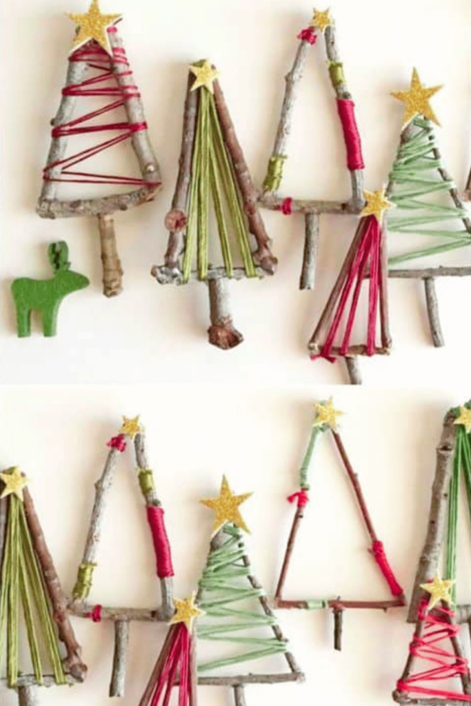 Mini twigs glued in the shape of trees with red & green twine accents