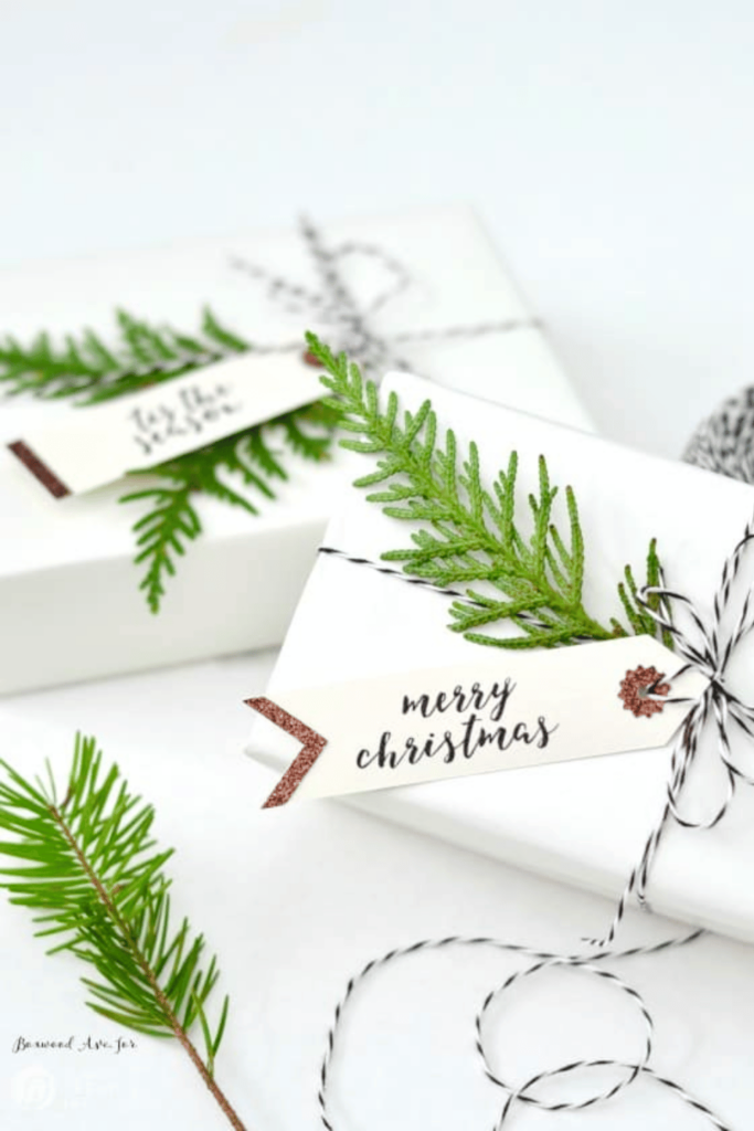 handmade festive gift tags with a christmas tree sprig