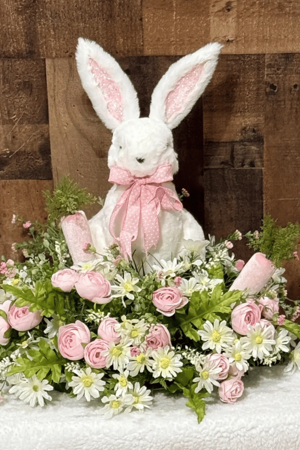 plush bunny and floral arrangement