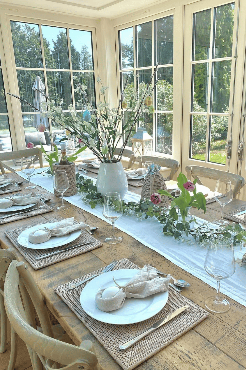 Light and airy Easter Brunch Tablescape with fresh florals, woven placemats, and soft neutrals.