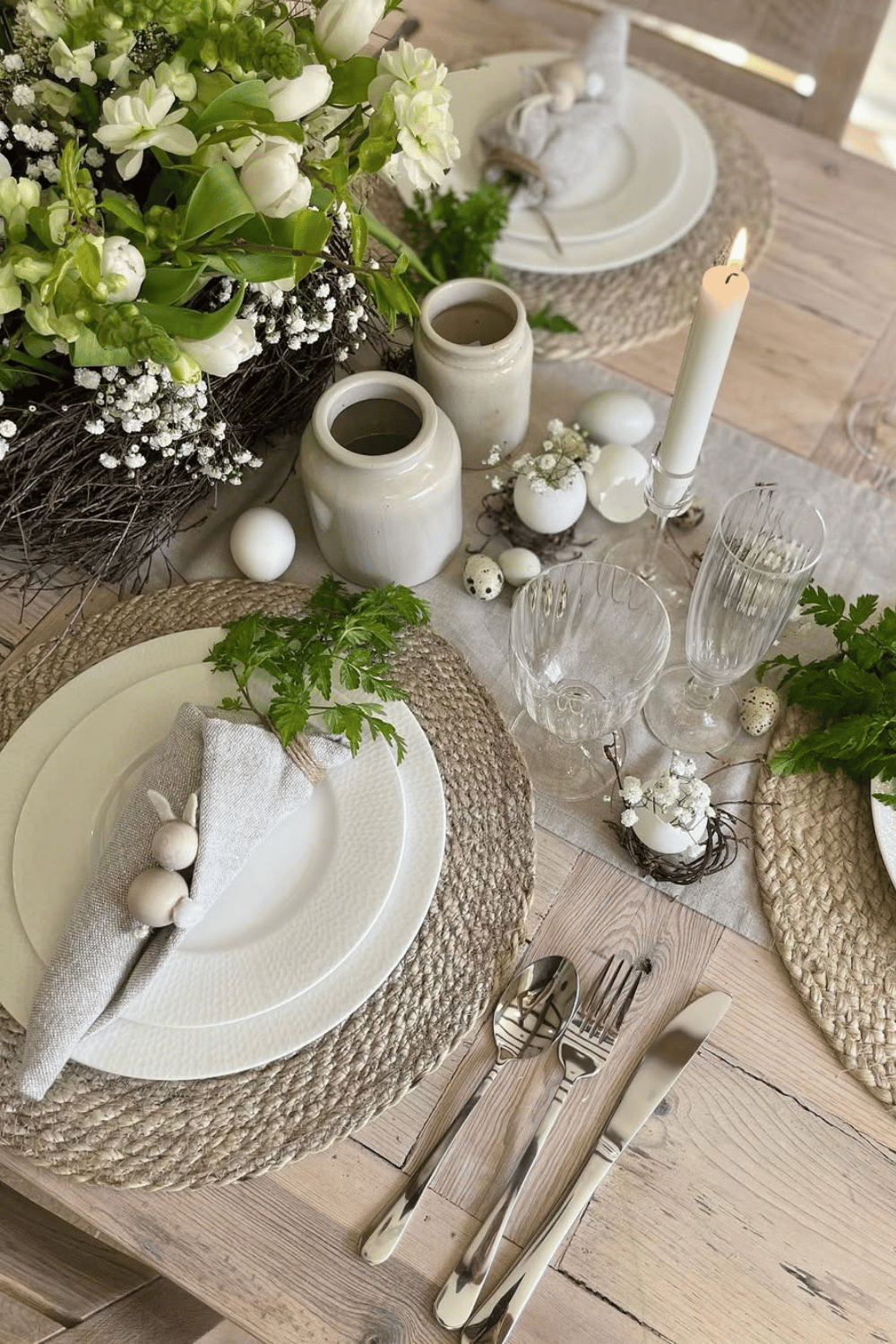 Scandinavian-inspired neutral Easter Tablescape with woven placemats, modern plates, and natural textures.