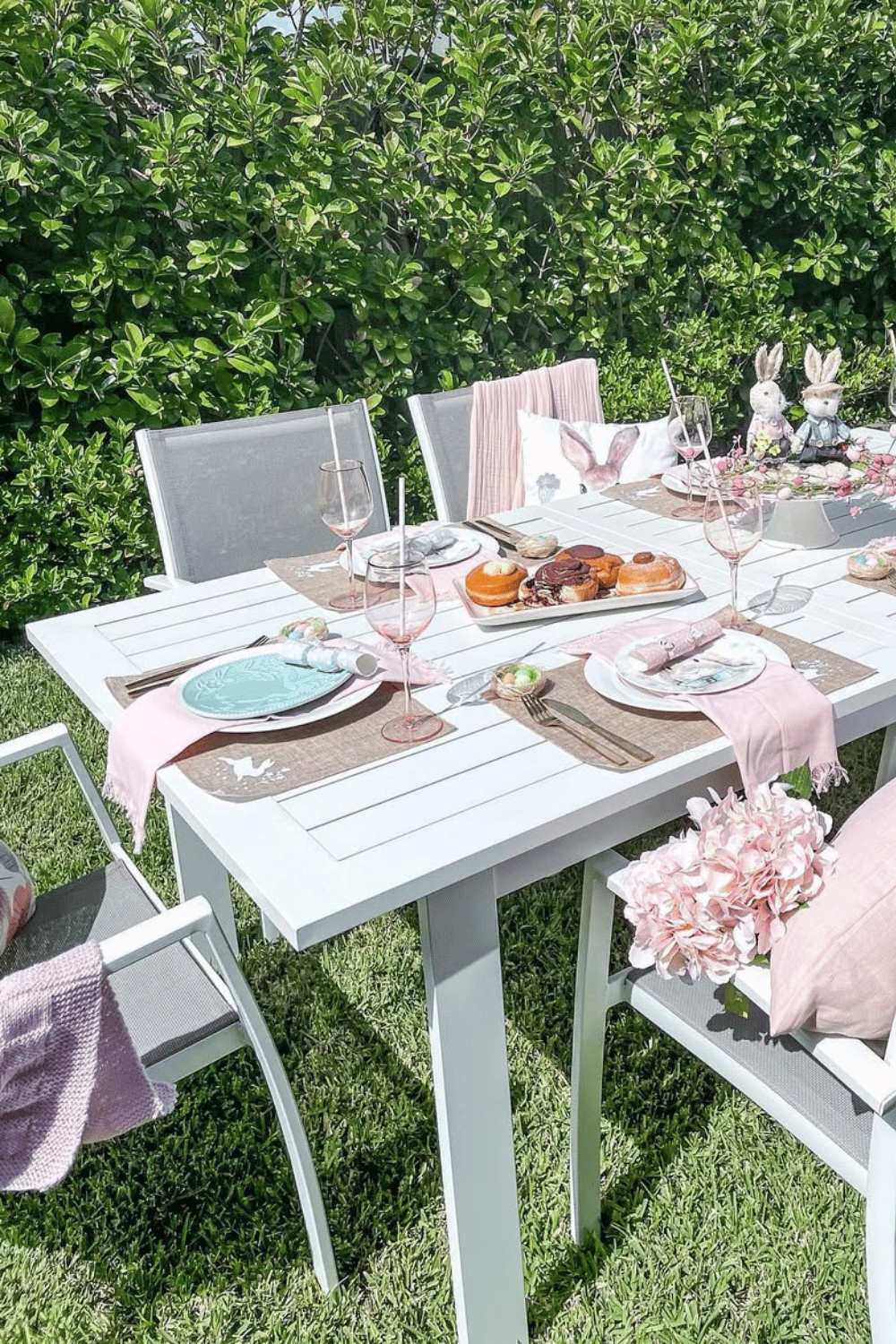 Outdoor Easter Brunch Tablescape featuring pastel decor, Easter Table Decorations, and blush pink glassware.
