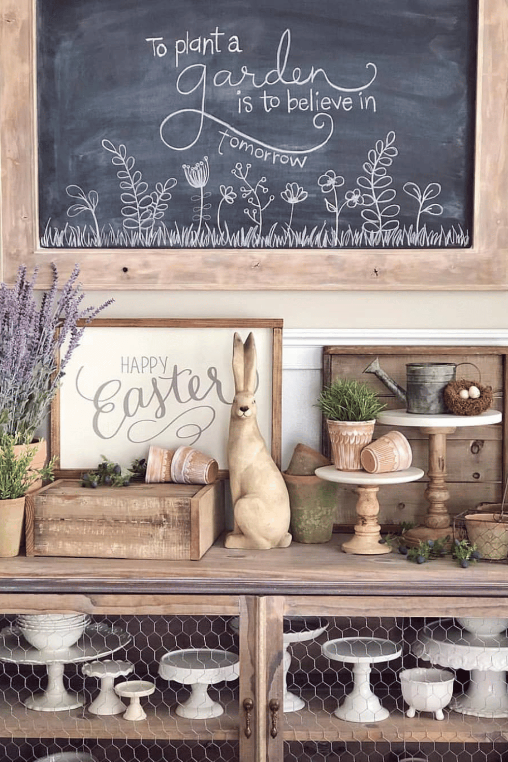 Farmhouse Easter hutch styled with wooden signs, pastel decor, and rustic elements.