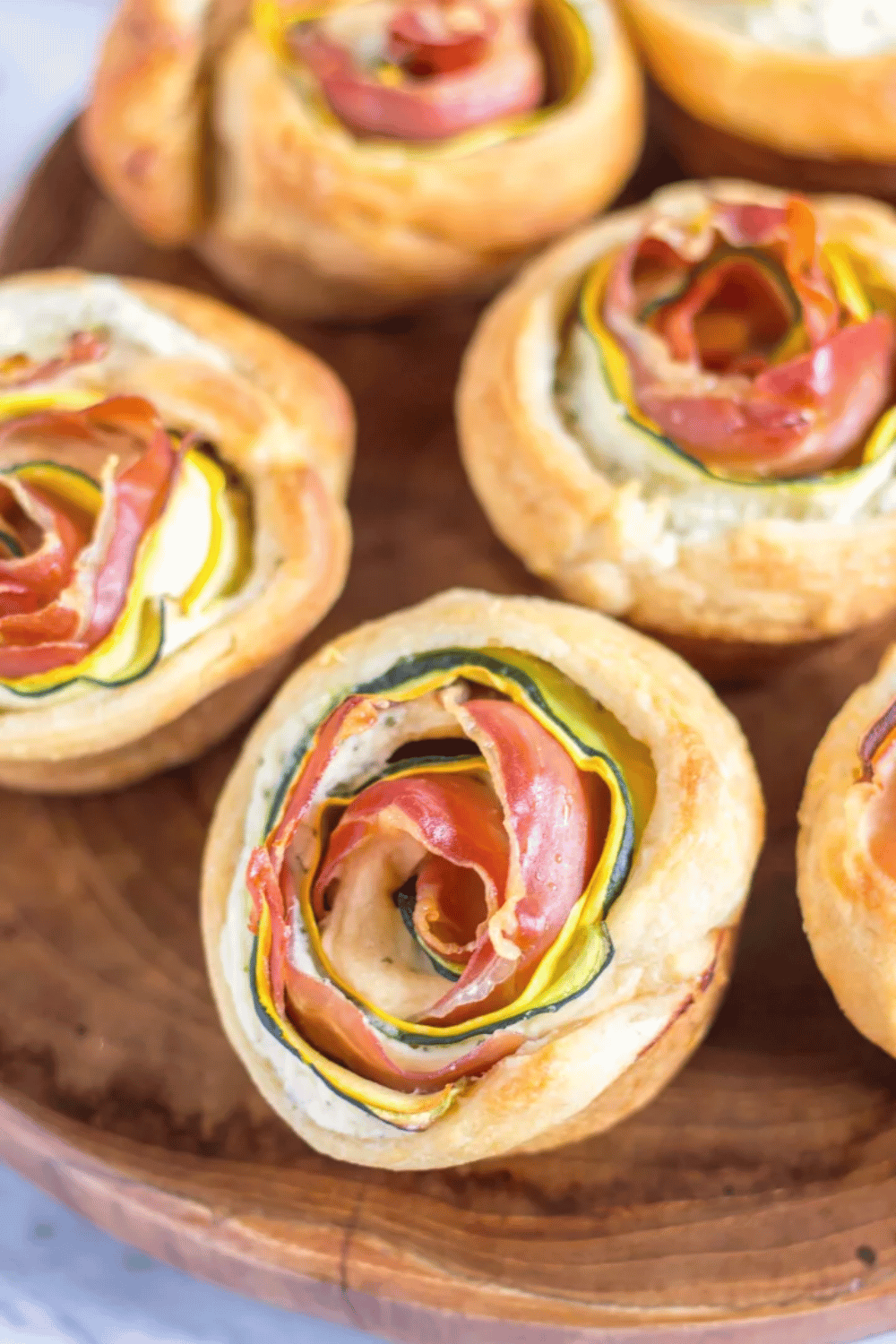 Wow your guests with these stunning prosciutto & zucchini rose pastries. An elegant and easy Easter appetizer perfect for spring entertaining!