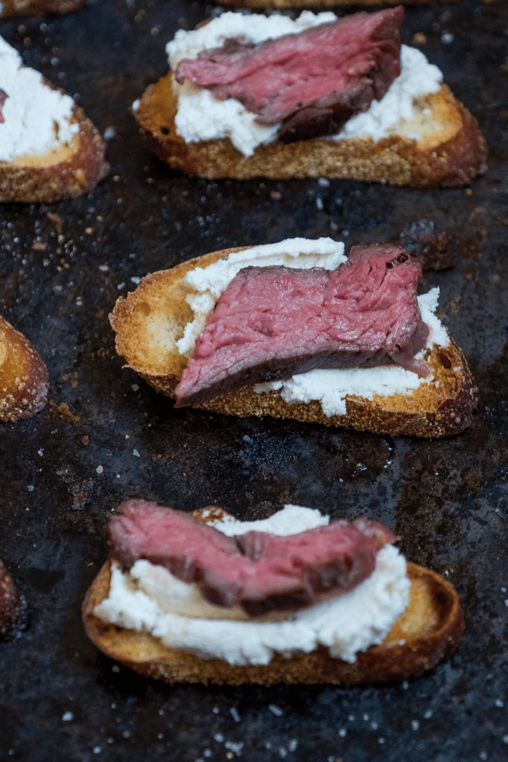 Treat your guests to a gourmet experience with steak & truffle honey ricotta crostini. an indulgent and delicious Easter appetizer!