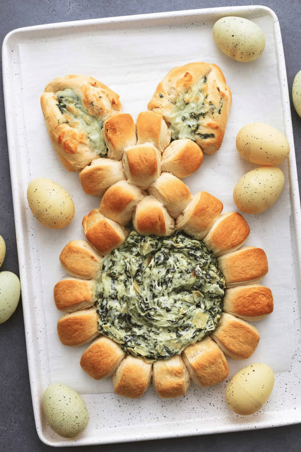 Make your Easter appetizer spread unforgettable with creamy spinach & artichoke bunny dip, a warm and shareable favorite!
