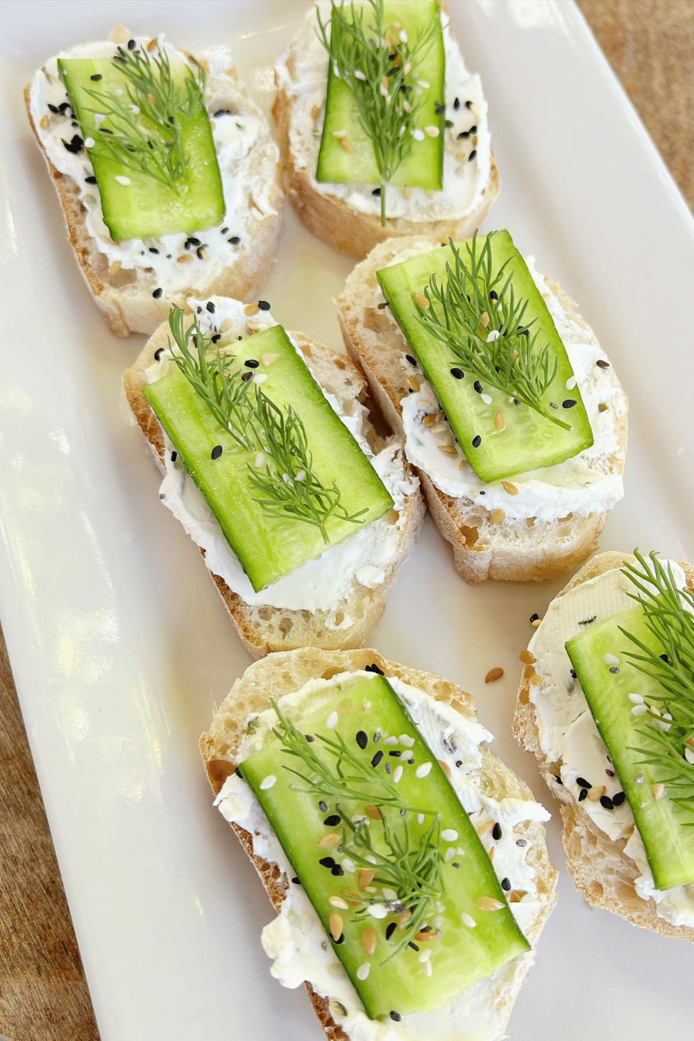Light, crisp, and fresh, these cucumber & cream cheese ciabatta bites are an easy and elegant spring appetizer for Easter entertaining!