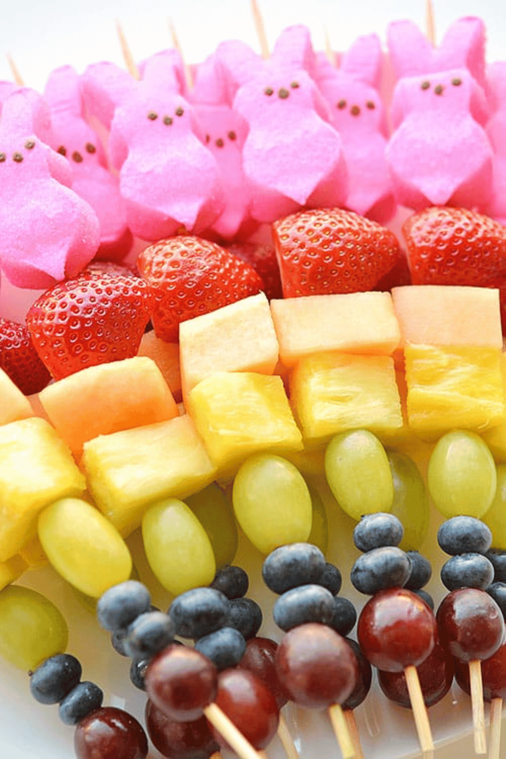 Peeps & fresh fruit skewers are a colorful, kid-friendly Easter fun food idea that’s perfect for spring gatherings!