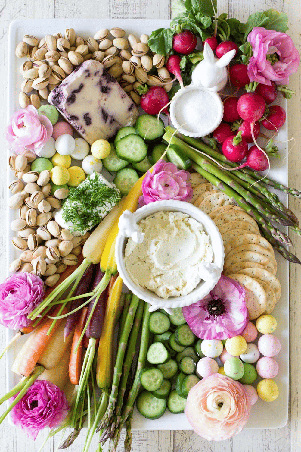 Make your Easter appetizer spread extra special with a gorgeous spring garden charcuterie board, perfect for feeding a crowd!