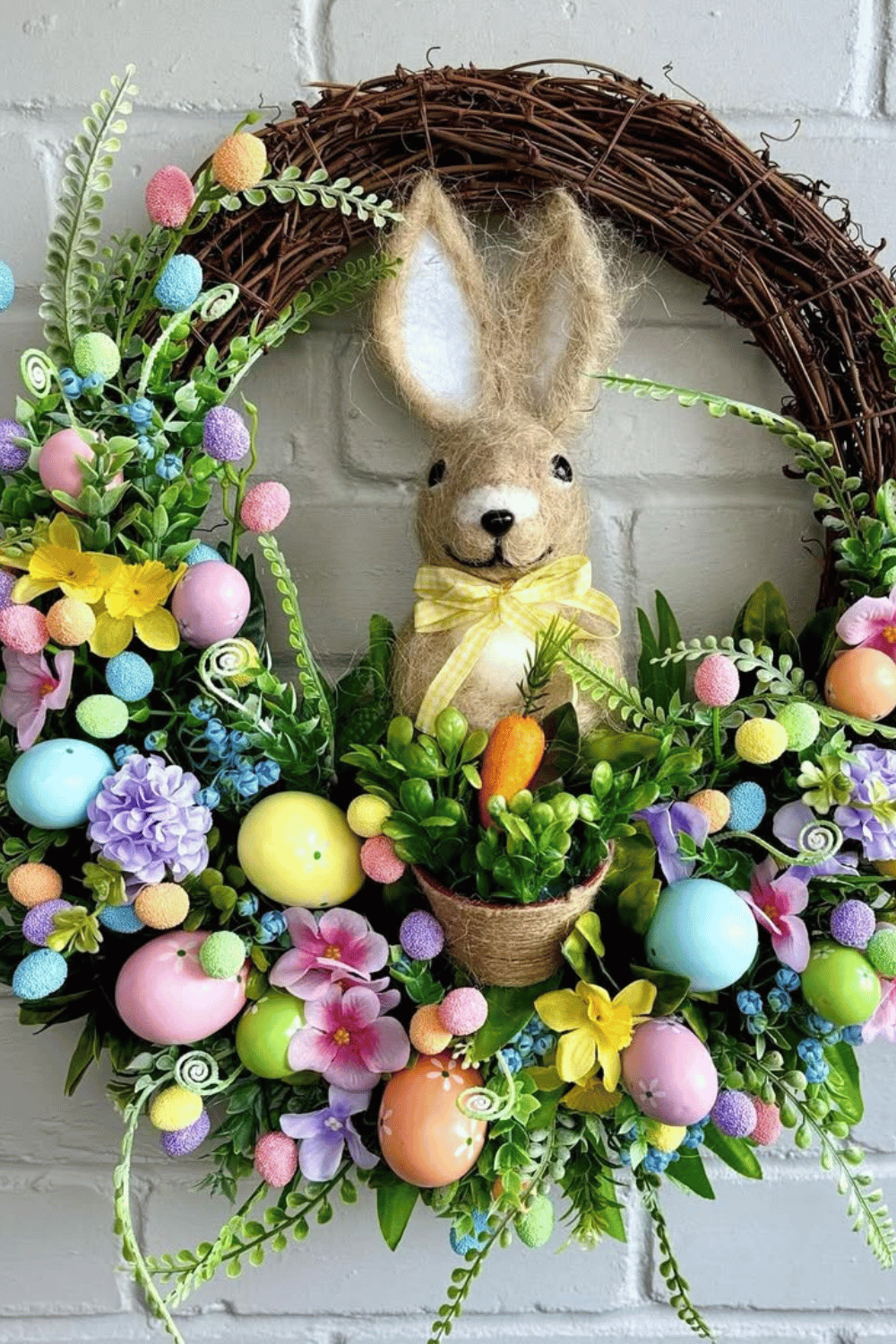 This Easter wreath combines vibrant colors with plush bunny decorations along with flowers and eggs.