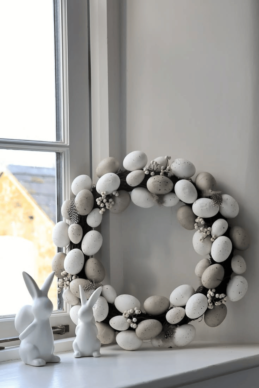 Natural materials combine with neutral tones to create a minimalist Easter egg wreath.