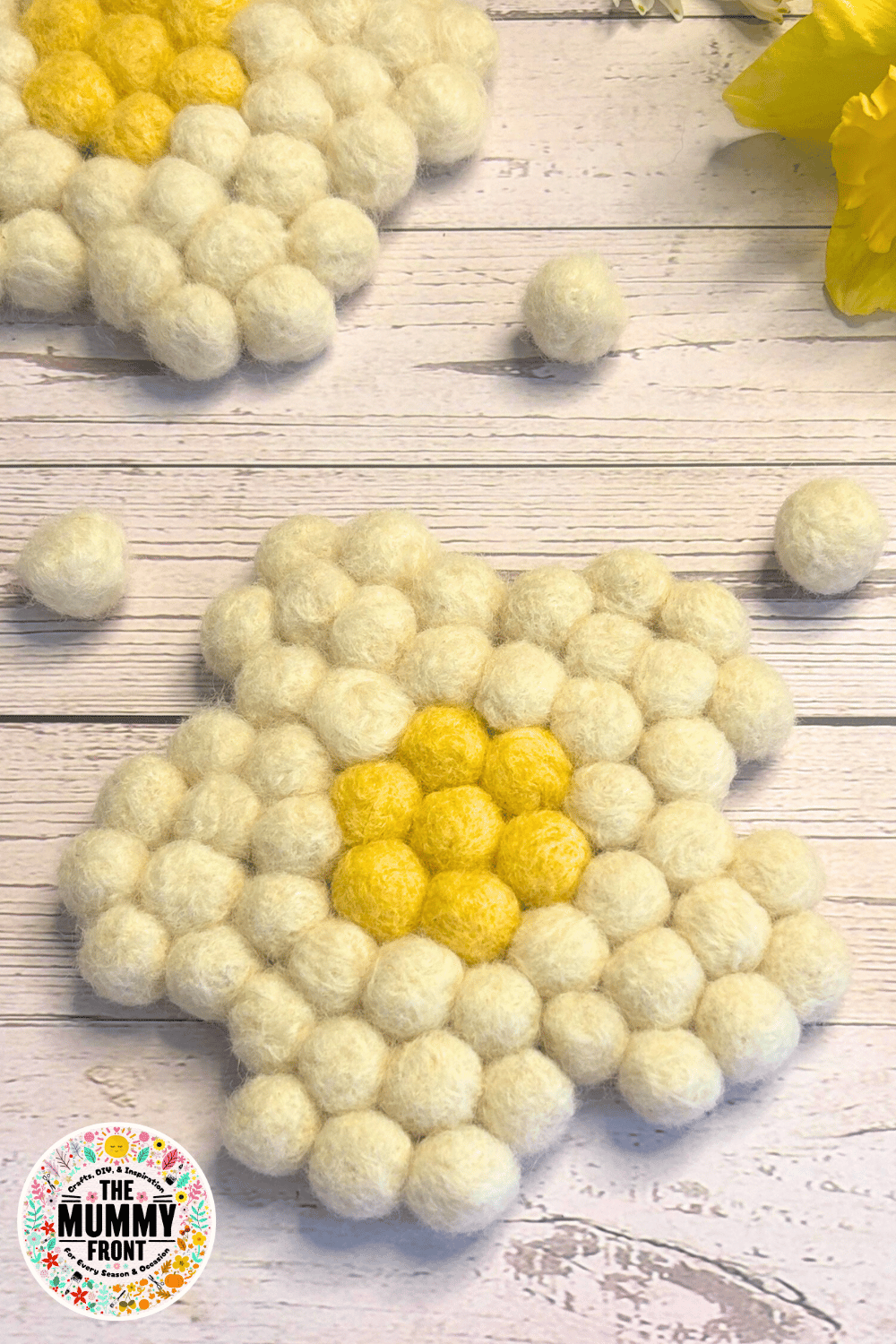 Add a fresh and fun touch to your home with these DIY Felt Daisy Coasters! This easy spring craft is perfect for creative afternoons and makes a beautiful handmade gift. Whether you love felt ball crafts, pom pom coasters, or spring flower projects, this tutorial is a must-try. Great for beginners, teens, and adults alike... get ready to fall in love with one of the cutest spring crafts around!