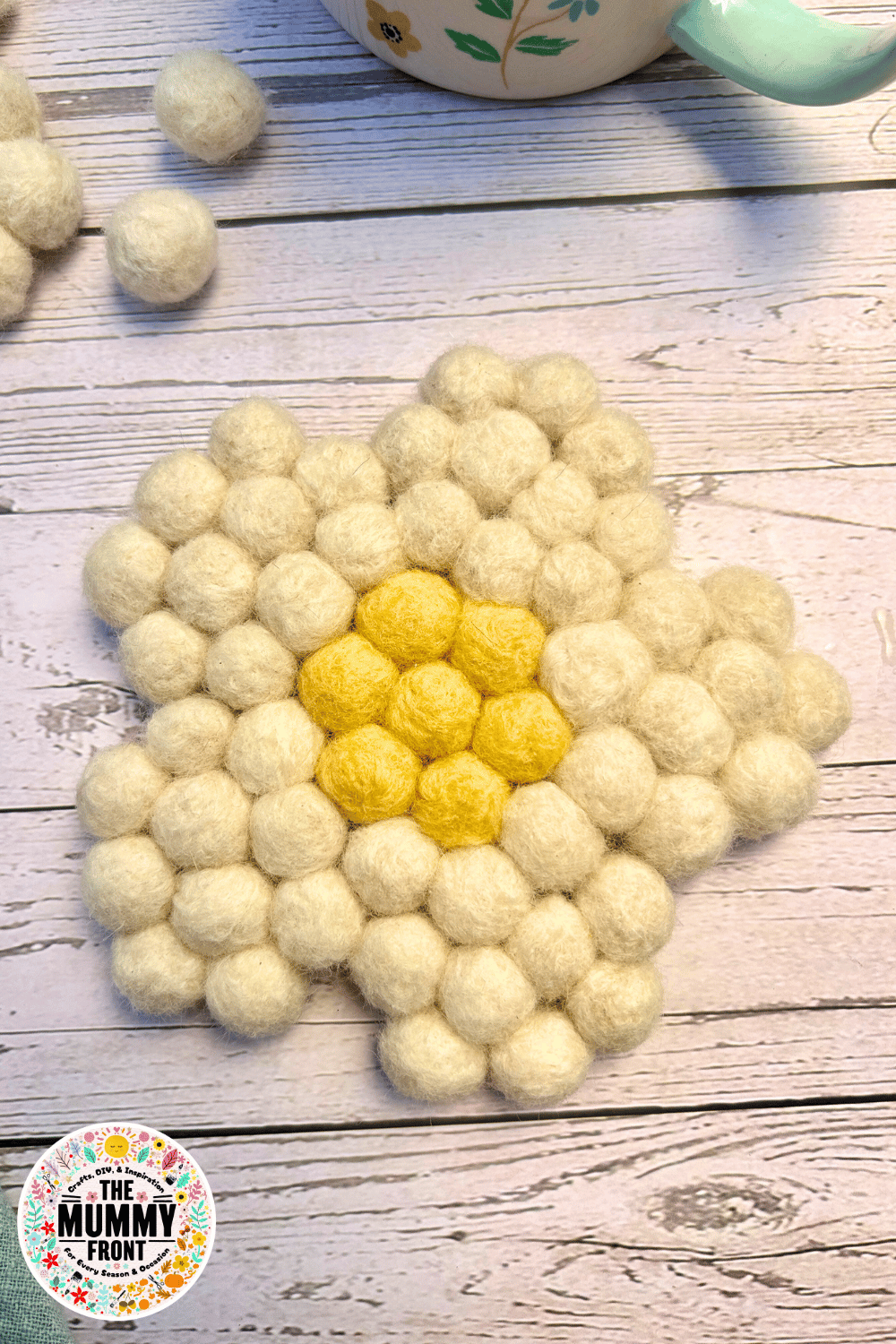 Add a fresh and fun touch to your home with these DIY Felt Daisy Coasters! This easy spring craft is perfect for creative afternoons and makes a beautiful handmade gift. Whether you love felt ball crafts, pom pom coasters, or spring flower projects, this tutorial is a must-try. Great for beginners, teens, and adults alike... get ready to fall in love with one of the cutest spring crafts around!