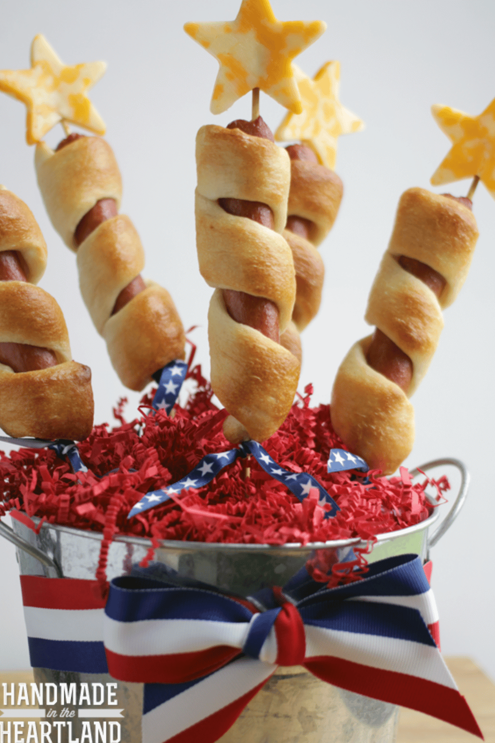 4th of July firecracker hot dogs wrapped in dough with star cheese toppers