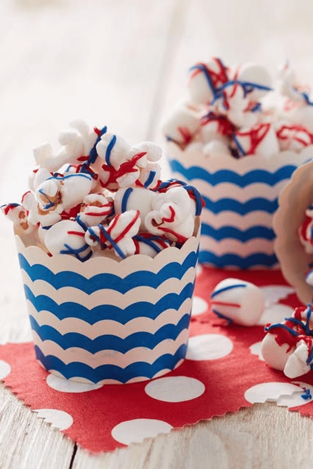 Red, white, and blue patriotic popcorn in festive paper cups