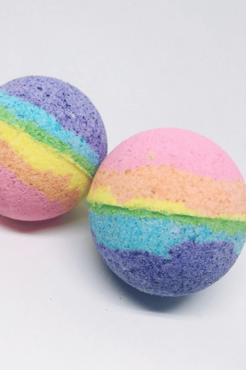 Colorful DIY bath bombs inspired by LUSH, displayed in a gift box