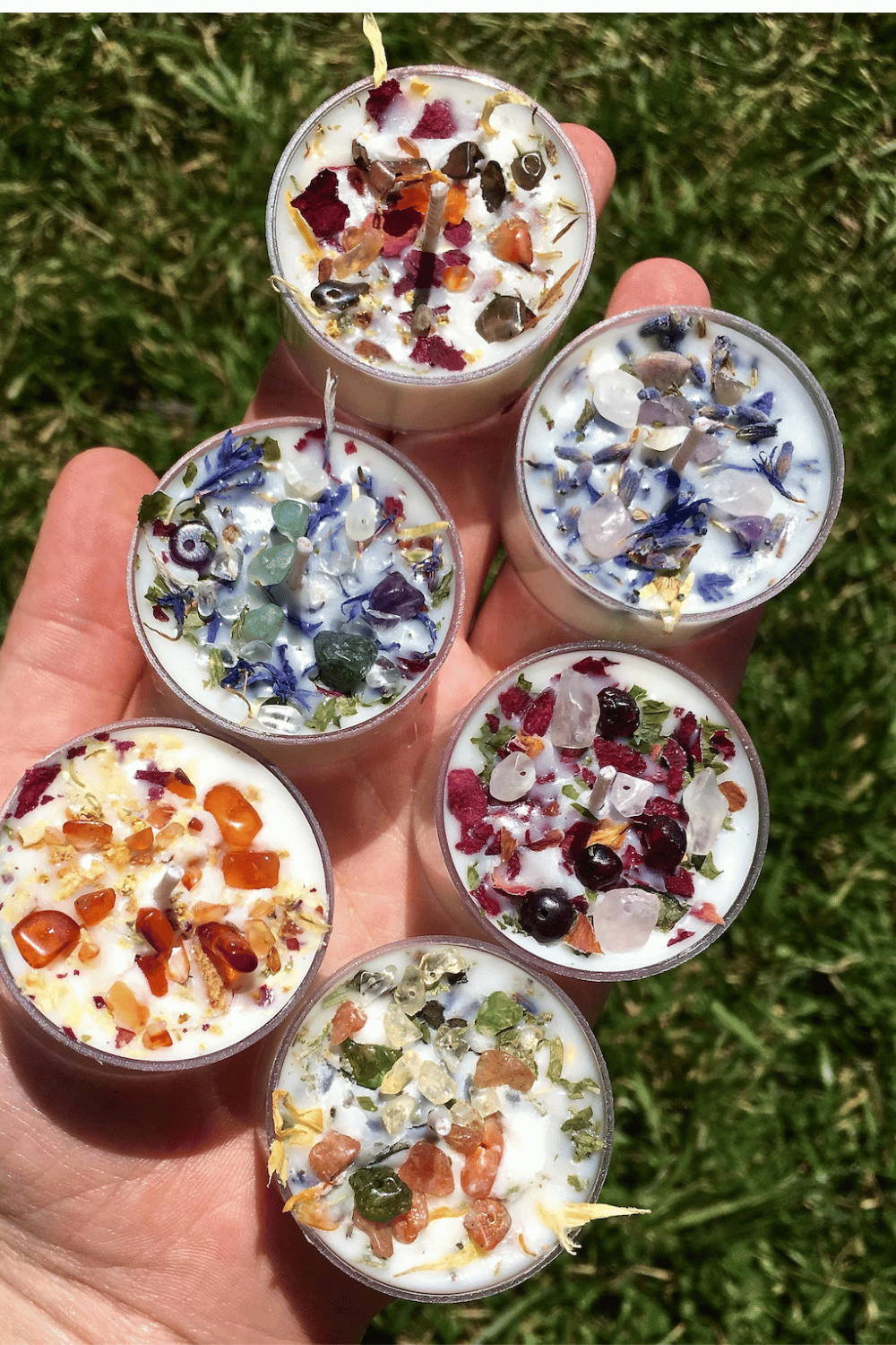 Crystal-infused tealight candles with dried flowers