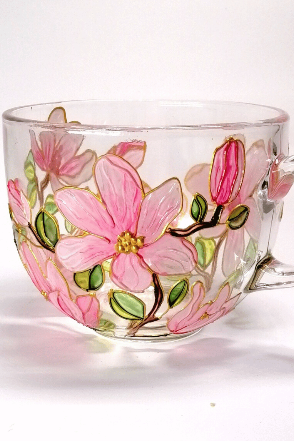 Pink magnolia blossom mug with hand-painted floral design
