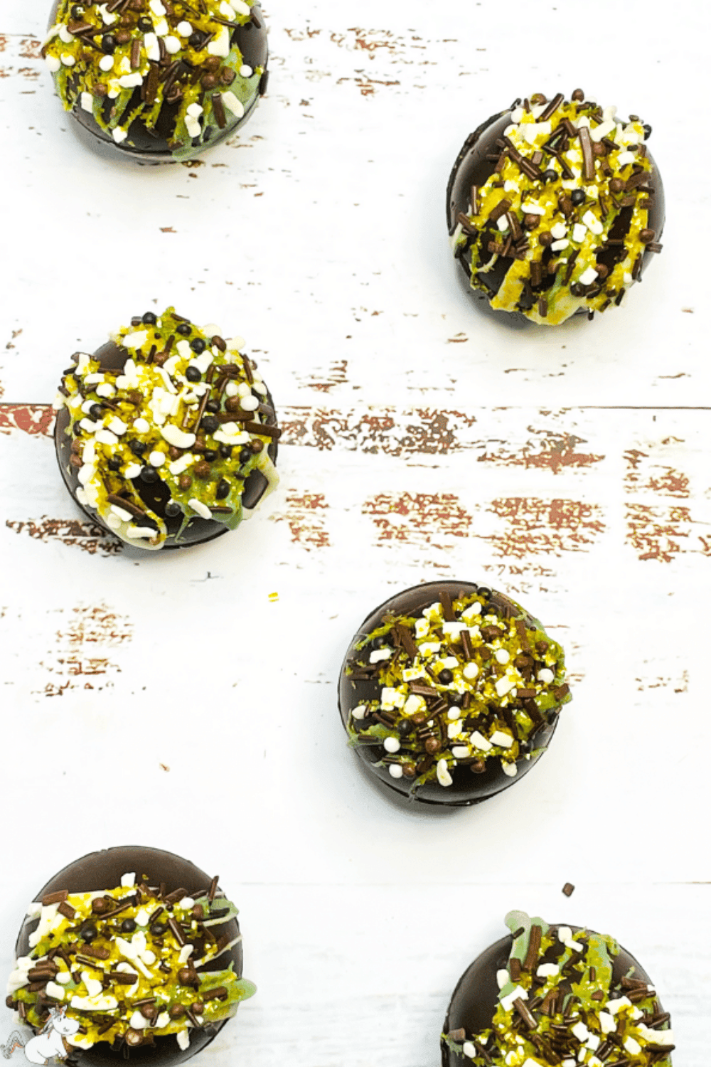 Hot chocolate bombs with marshmallows and sprinkles inside