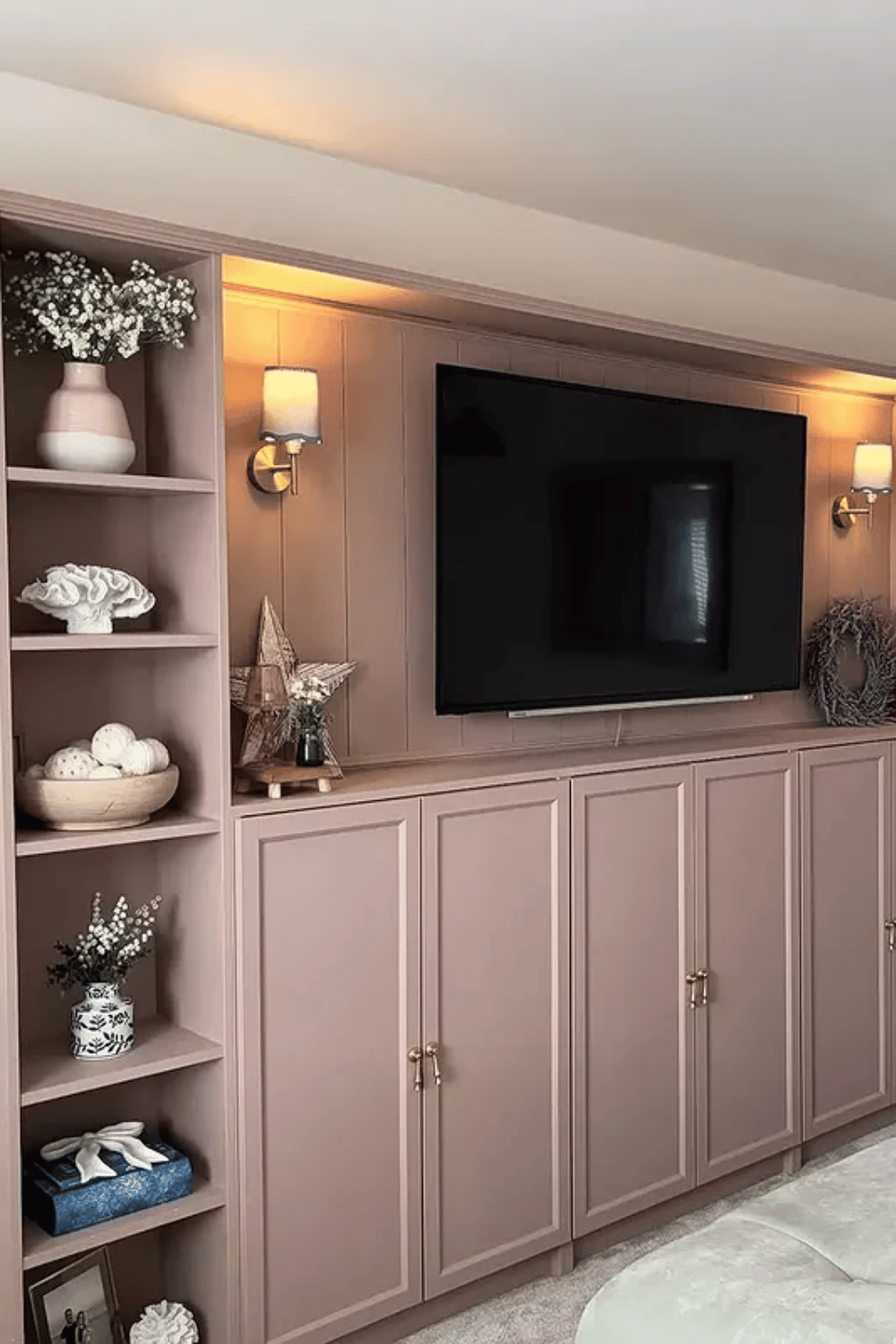 Custom looking media wall using Ikea Billy bookcases creative living room hack