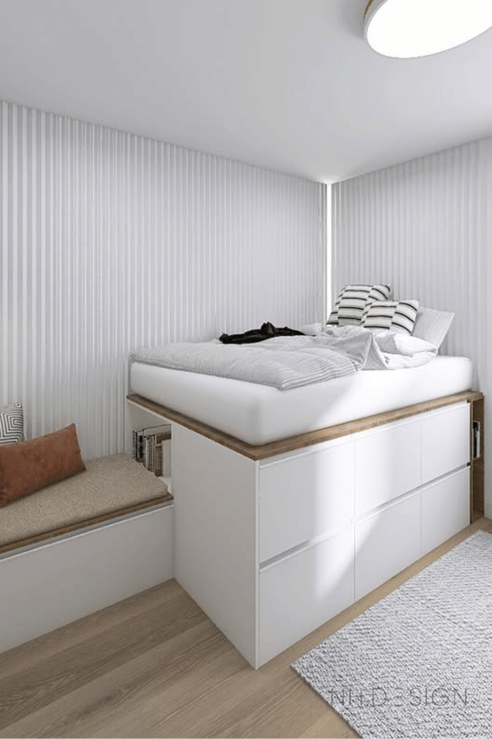 Ikea Metod cabinets under a raised bed maximizing bedroom storage in small spaces