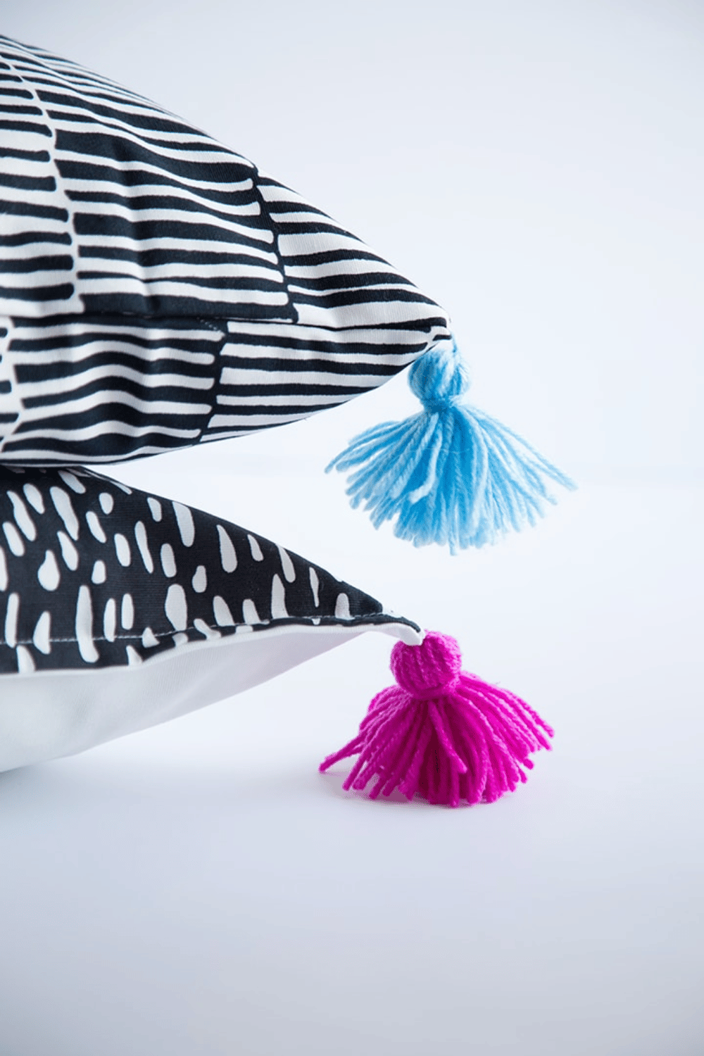 Ikea pillowcase with handmade yarn tassels easy budget home decor