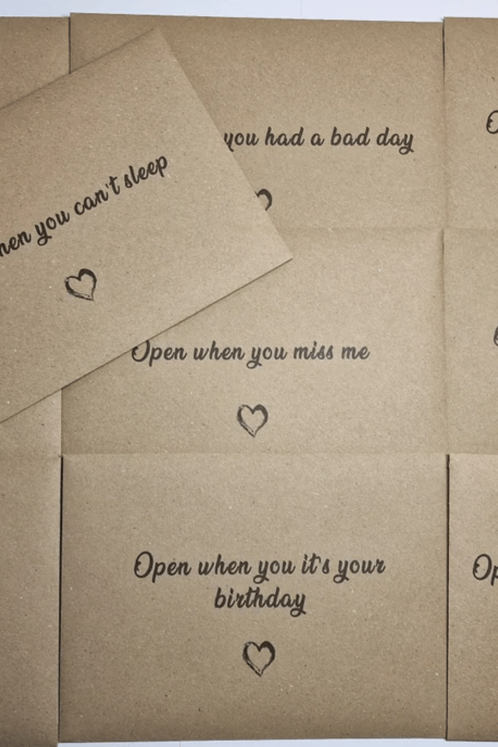 “Open When” envelopes labeled for different moments and emotions