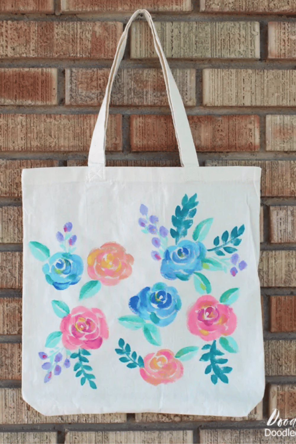 Hand-painted canvas tote bag with watercolor flower design