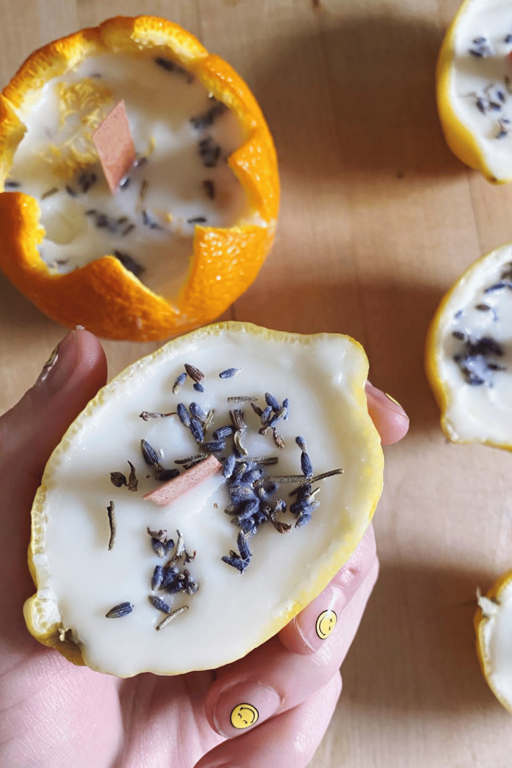 Lavender citrus candle poured into an orange peel