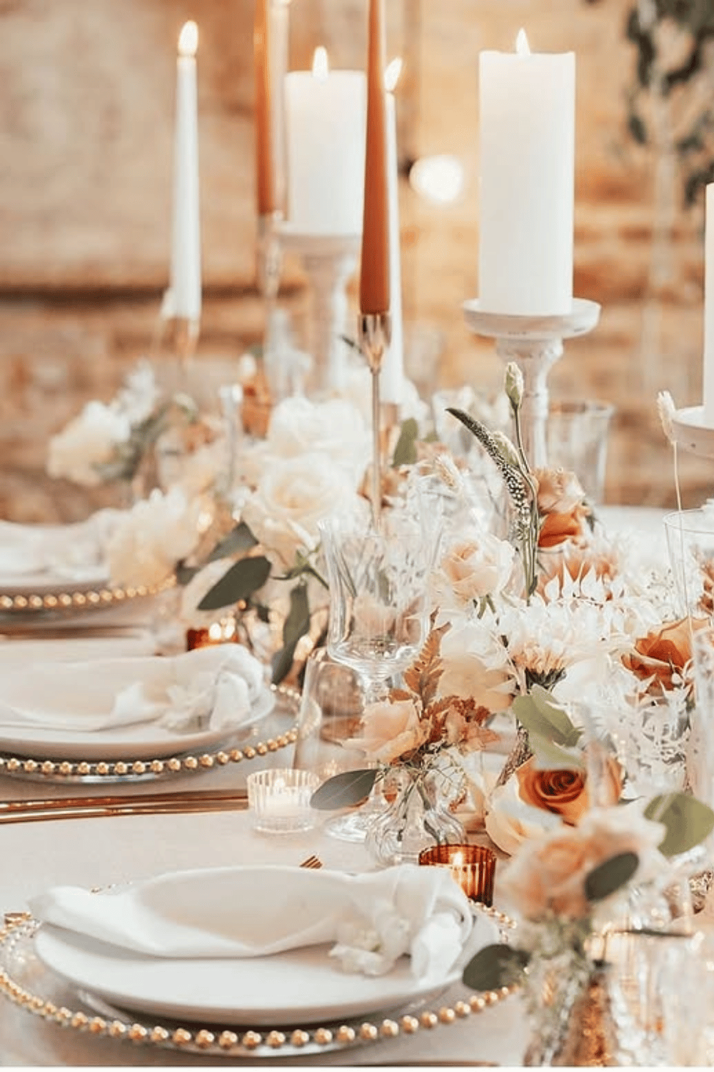 Elegant neutral wedding table with soft tones and delicate gold trim. Wedding Table Designs