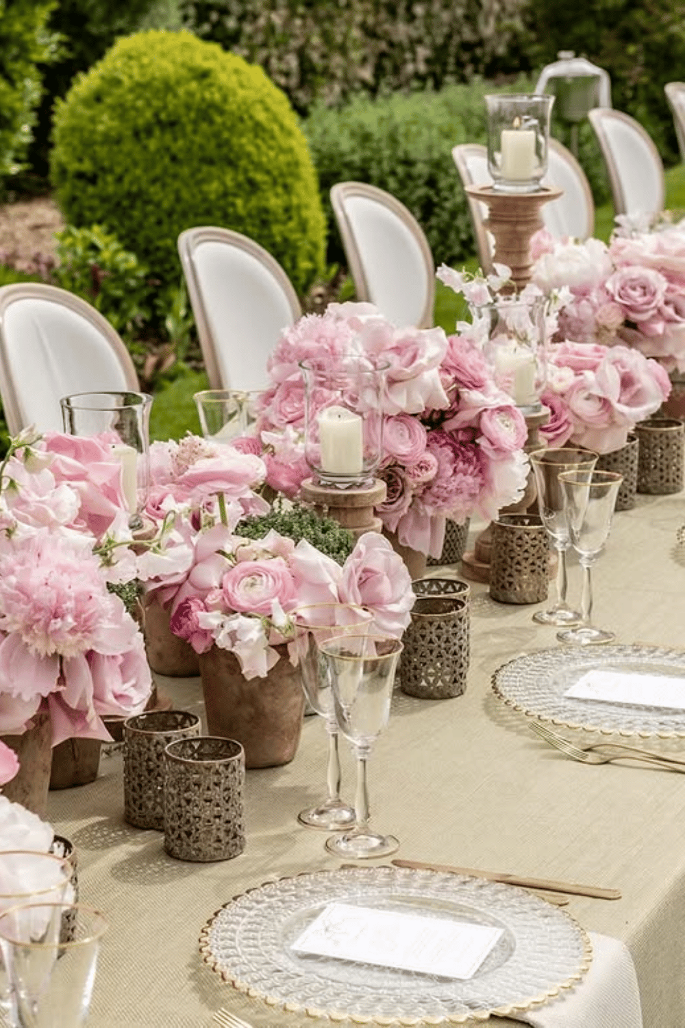 Romantic garden table with soft pink florals and vintage gold accents