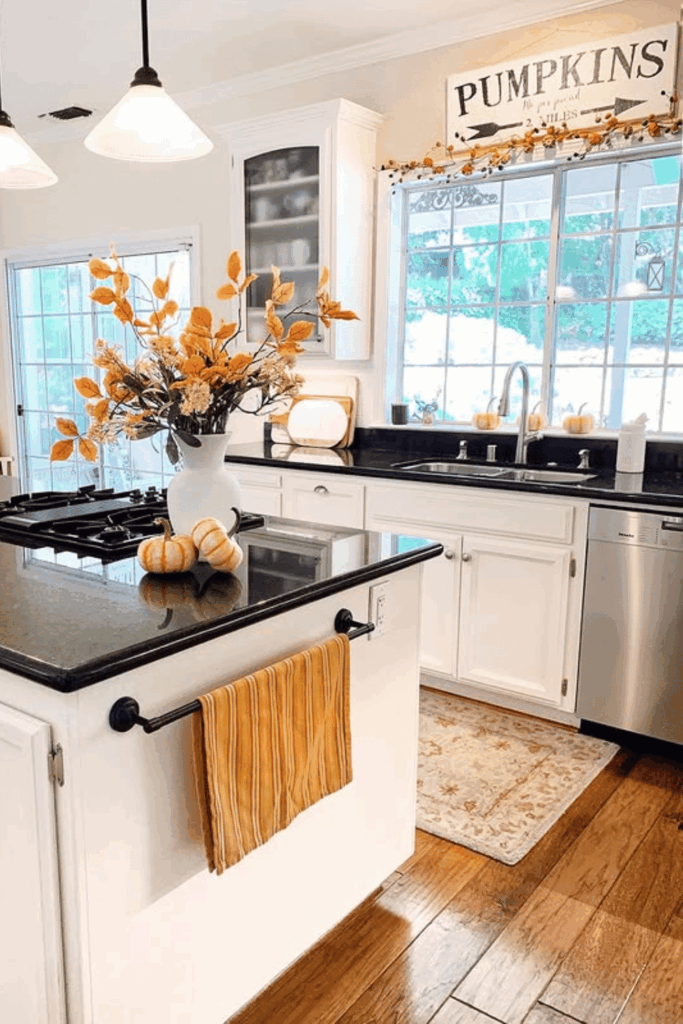 Statement vase with fall stems as the focal point of fall kitchen decor