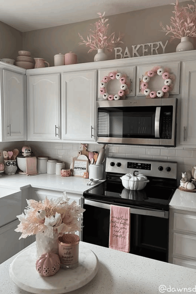 Neutral fall kitchen color palette with blush and cream decor touches