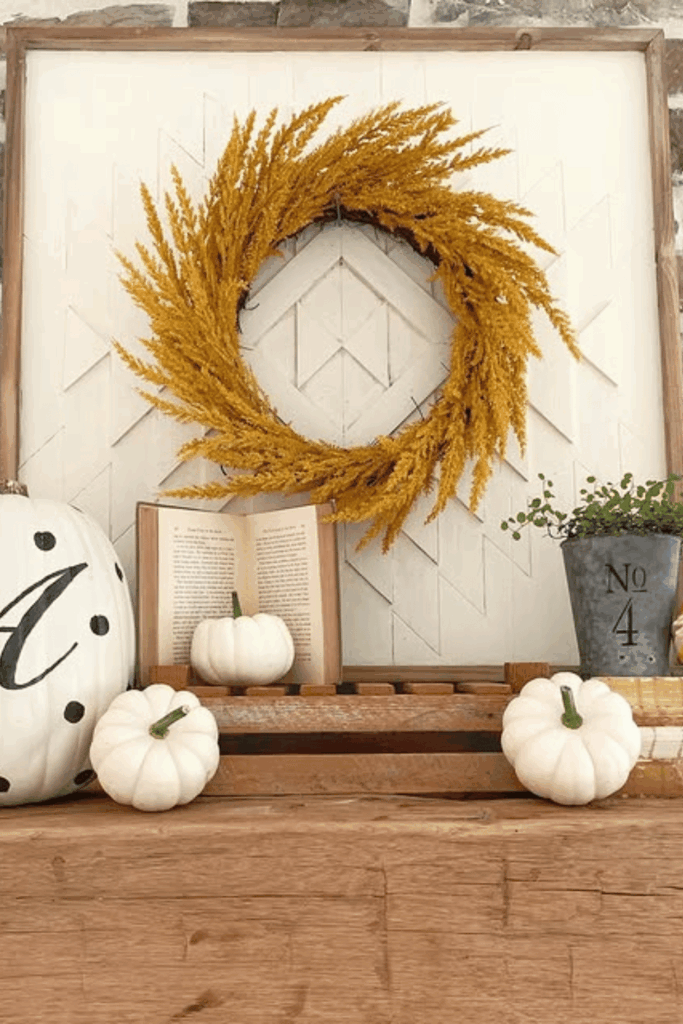 Rustic farmhouse wreath styled as fall mantel decor idea