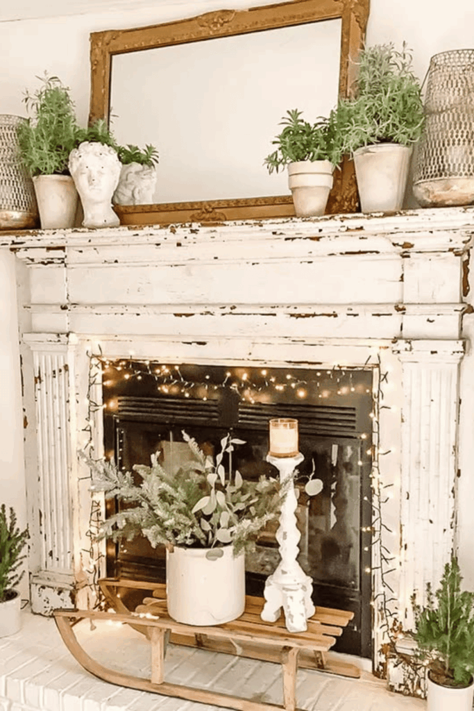 White theme mantel decor with neutral pumpkins and greenery