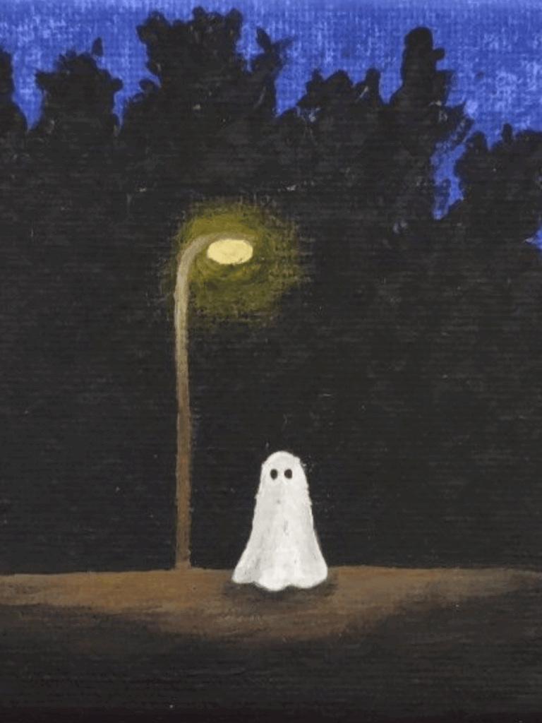 Small ghost standing under a glowing lamp post